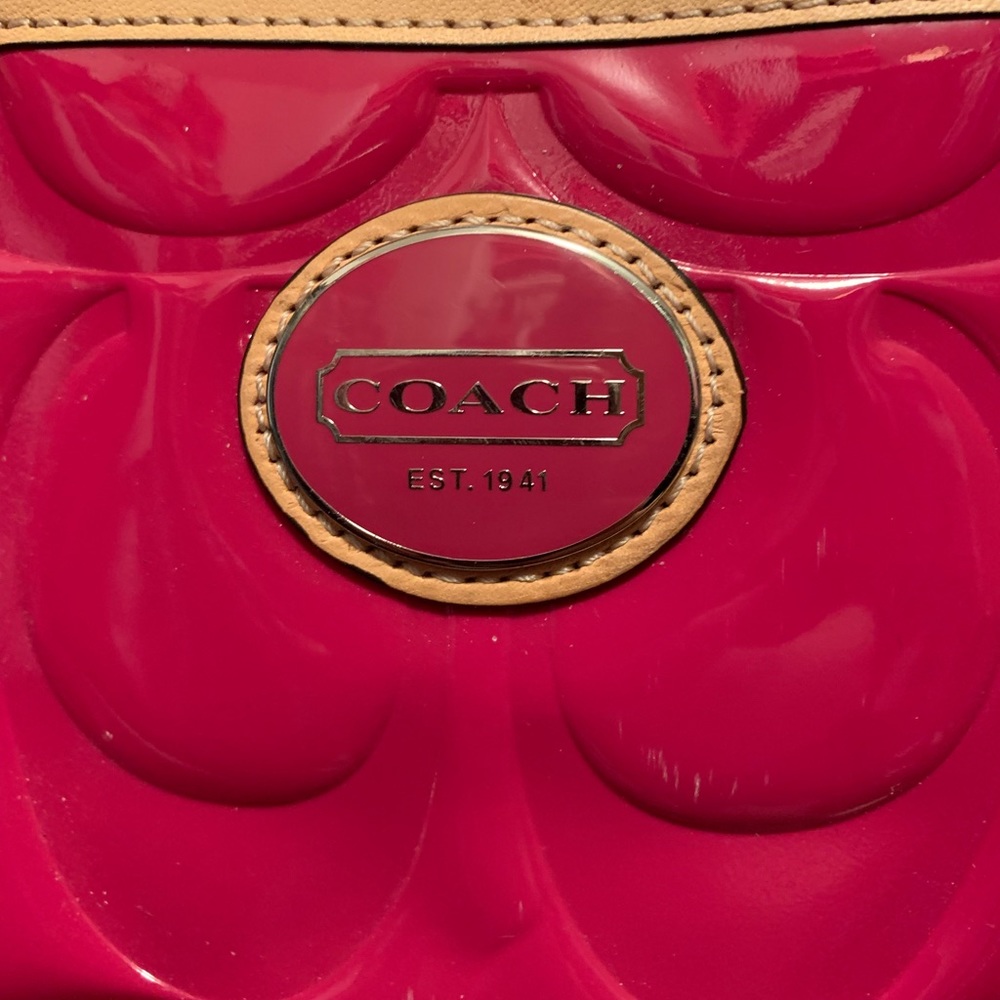 Pink and tan coach purse